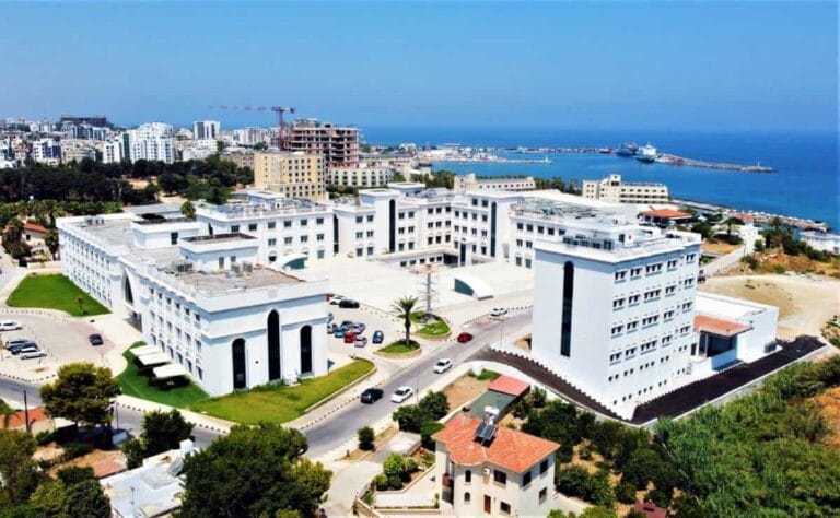 University of Kyrenia campus aerial view showing modern buildings and Mediterranean coastline in North Cyprus